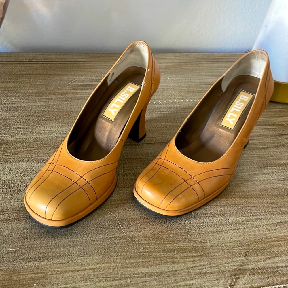 B. Silly retro square toe gold heels size 5.5.